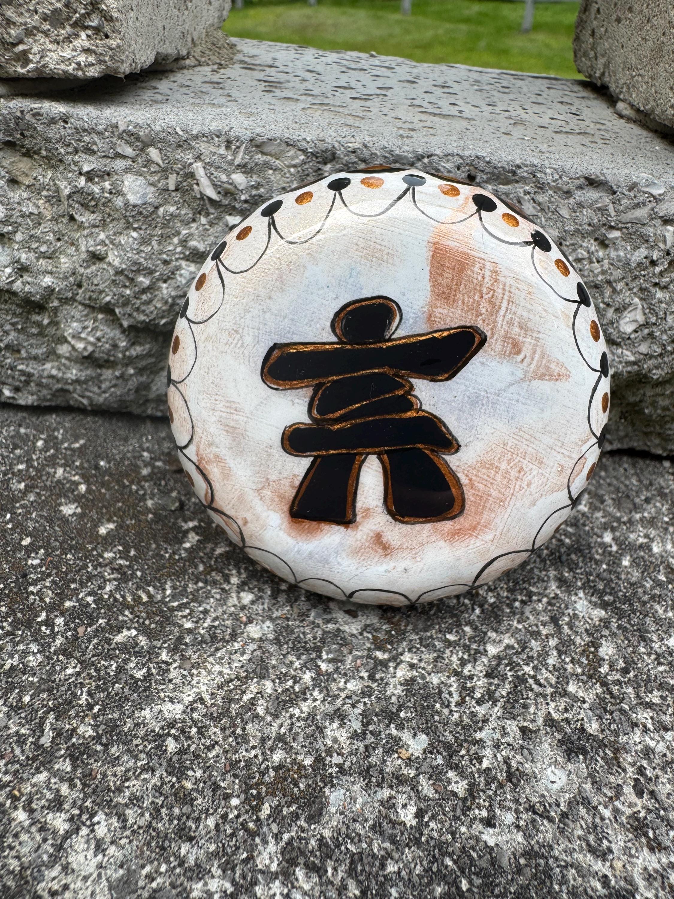 White Inukshuk Sculpture: Copper & Black Detail