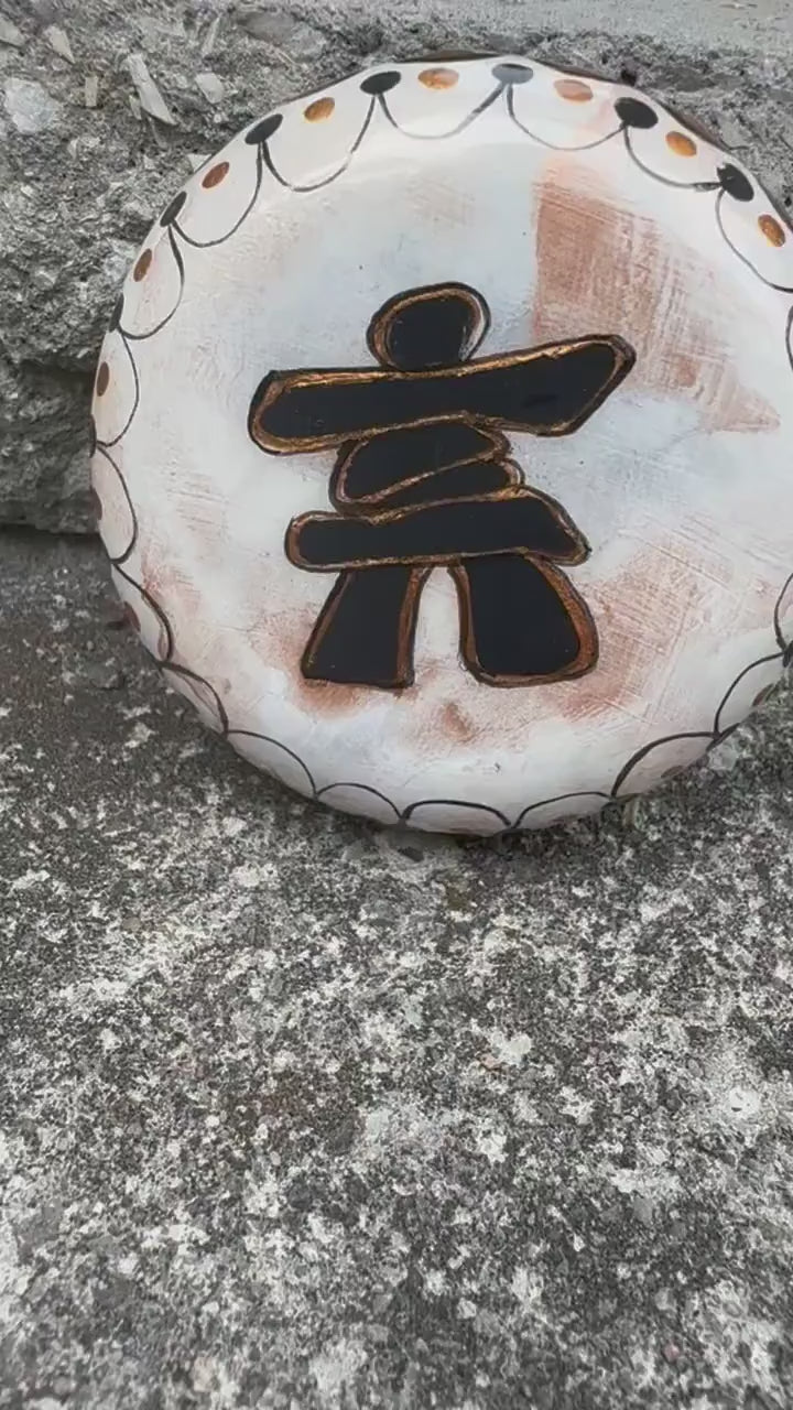 White Inukshuk Sculpture: Copper & Black Detail